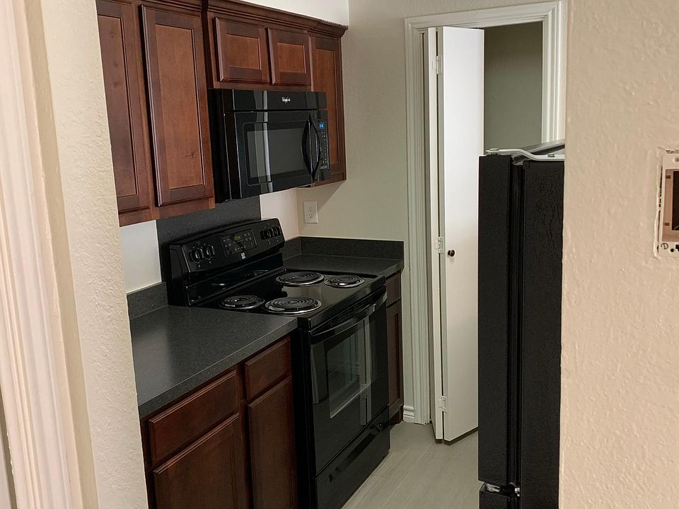 New cabinets and tile. Pantry in kitchen