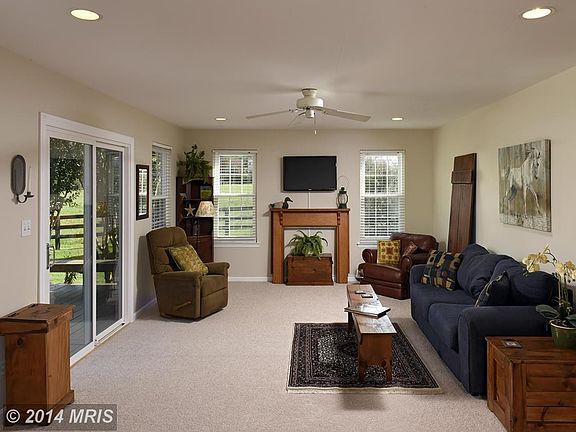 Family Rm right off Kitchen w/glass doors to deck.