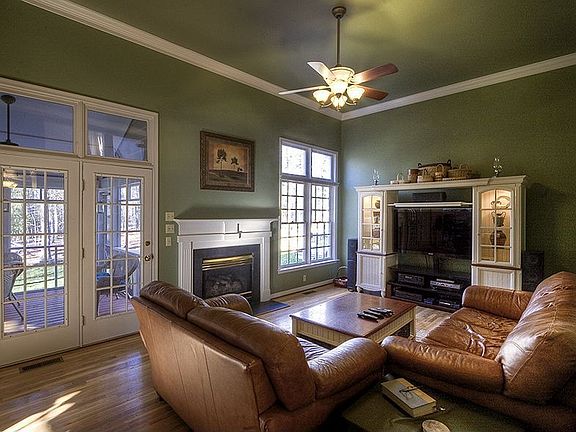 Family Room with 14 Foot Ceilings & Gas Fireplace