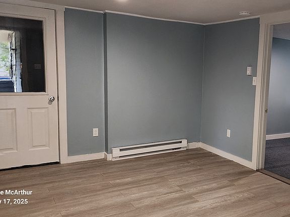 Living room area from entrance. Please note door which is entrance to utility room. Landlord may require entrance with 24 hour notice for non emergencies.