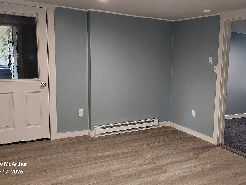 Living room area from entrance. Please note door which is entrance to utility room. Landlord may require entrance with 24 hour notice for non emergencies.