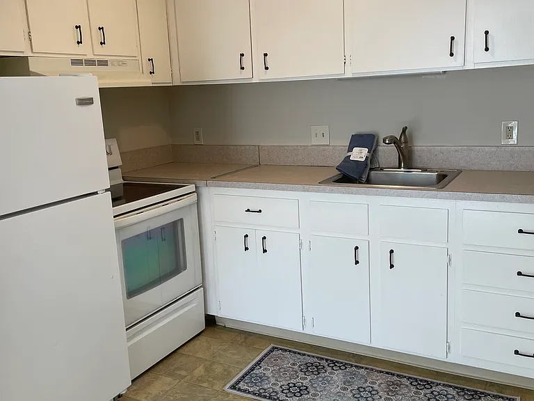 Lots of kitchen cabinet space and well lit