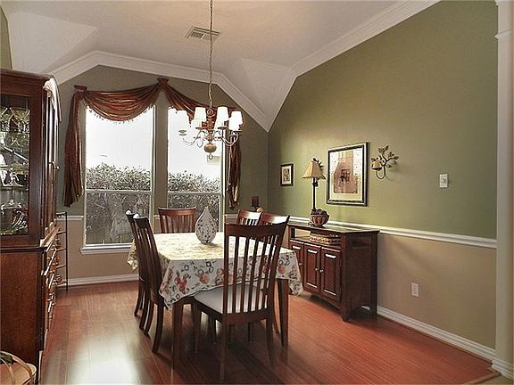 Beautiful formal dining with chair rail.