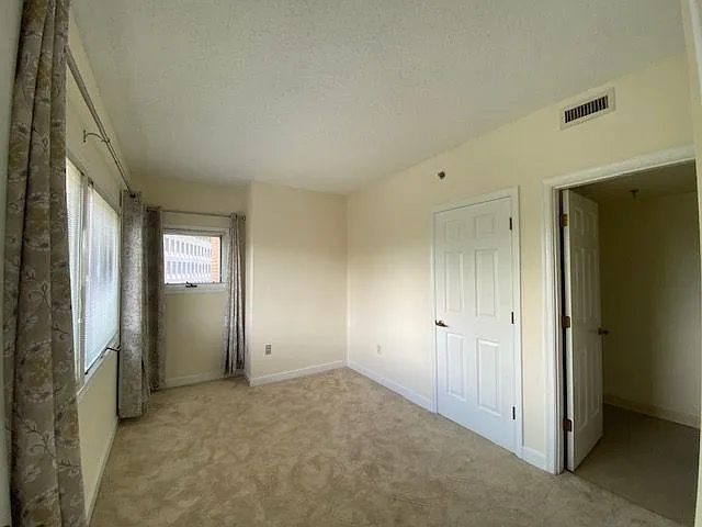 Bedroom #2 with ensuite full bath and closet.