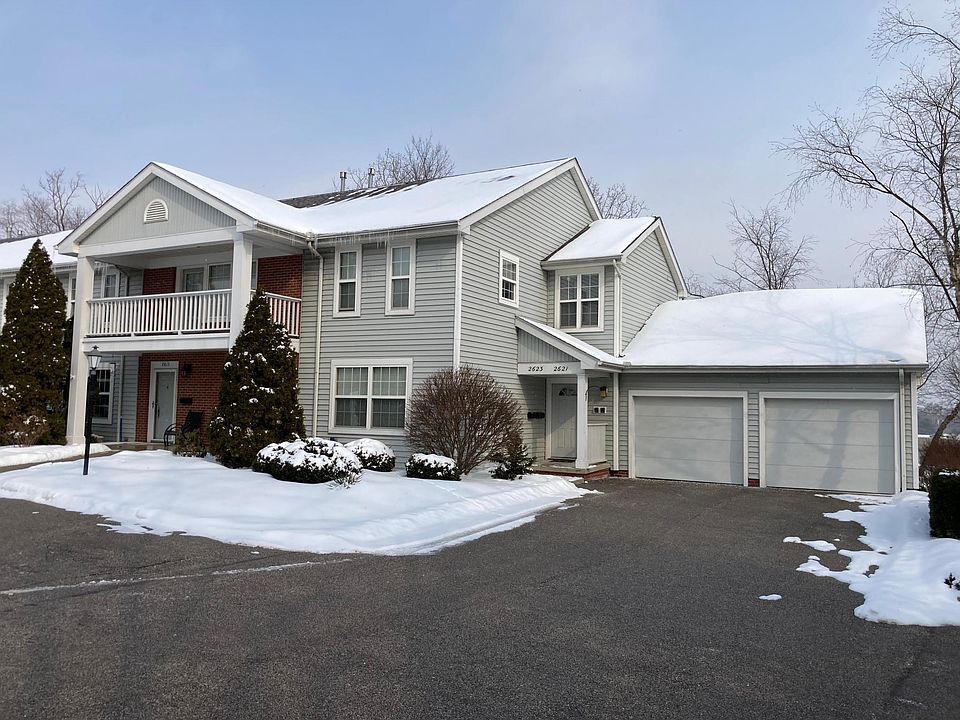 Garage attached to inside stairwell to only two apartments. Left garage included with subject apartment.