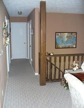dining room view of hall upstairs
