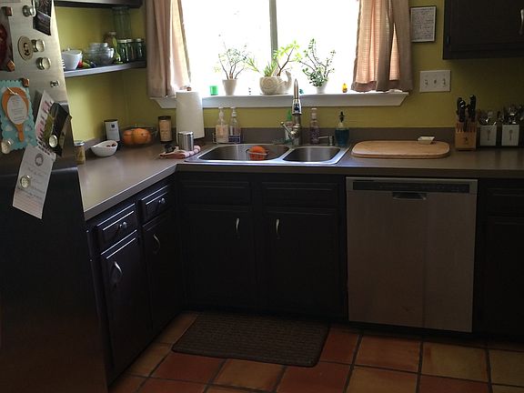 Kitchen with view of backyard and greenbelt