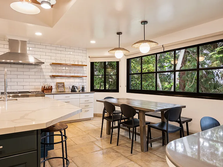 Dining nook with seating for six, an ideal spot for brunch or family meals.