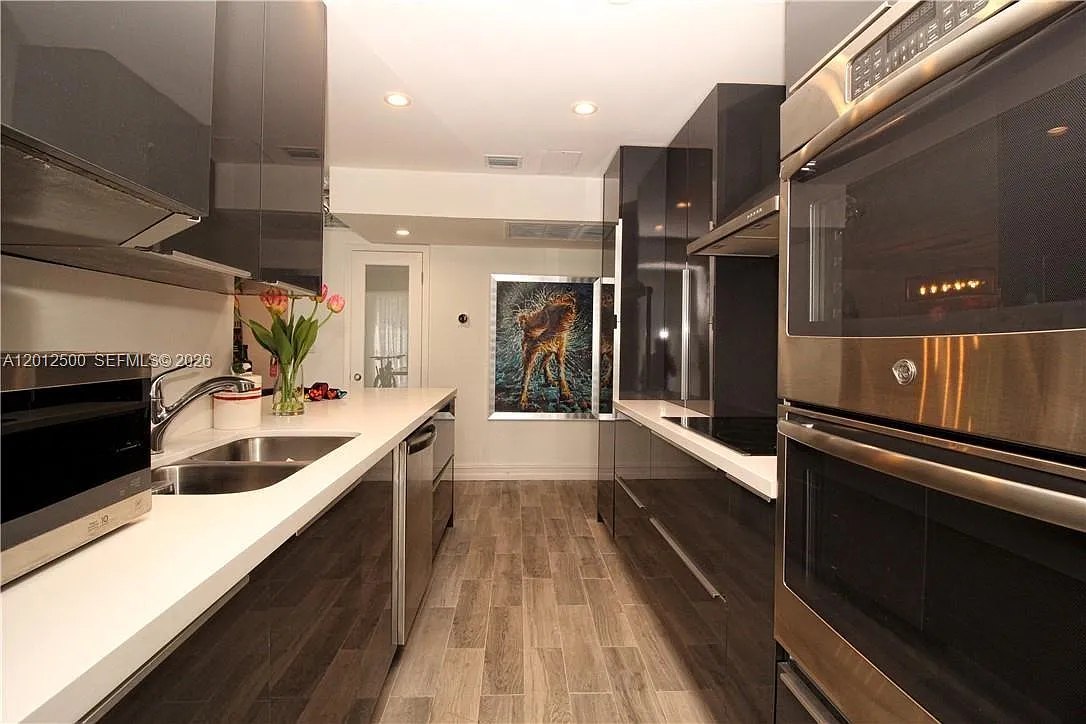Building Photo - 17560 Atlantic Blvd #201