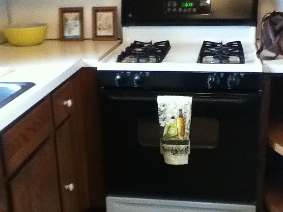 galley kitchen with gas stove
