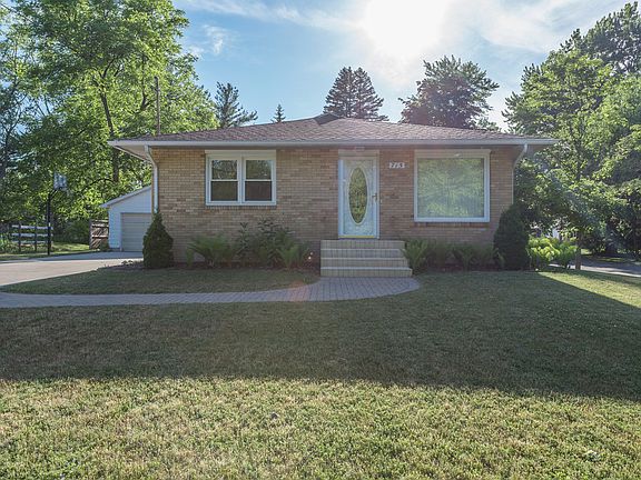 This home has great curb appeal with a concrete walk to the front door, and large front yard. Easy care Michigan native plants can be found throughout the property. 