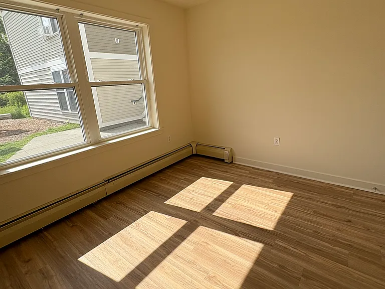 bedroom one. double door closet across from windows