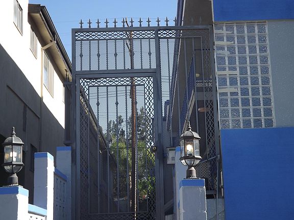 Controlled access entry way with intercom control