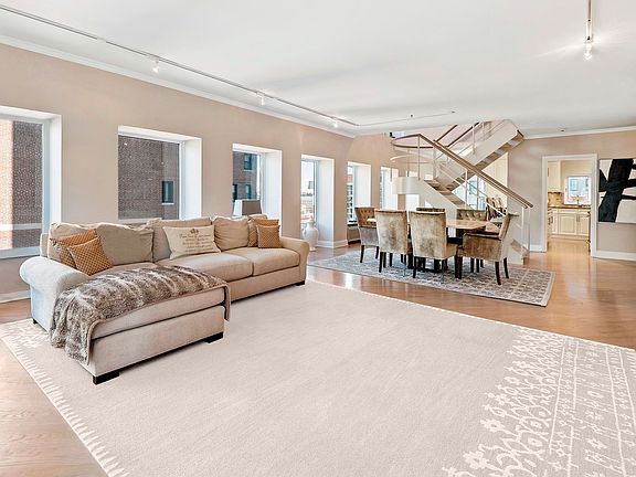 Fall in love with this stunning duplex in the sky!Â Southern, northern and western exposures flood t