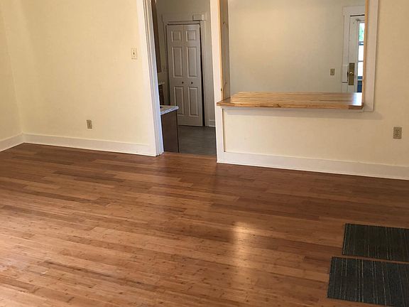 Beautiful bamboo flooring throughout apartment.