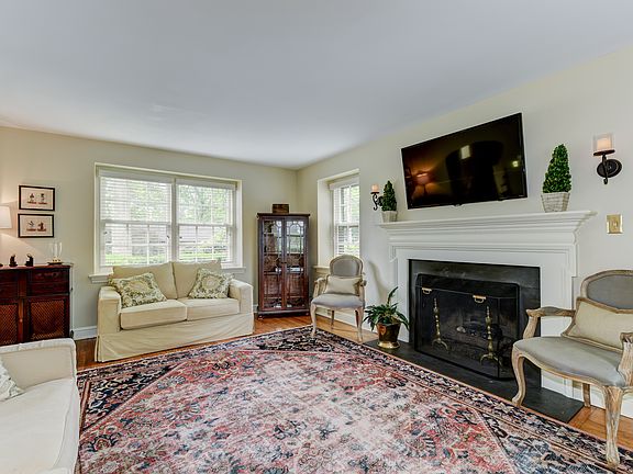 Beautiful living room with stone gas fireplace
