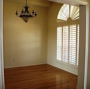 Wood Floors and Shutters in Formal Dining