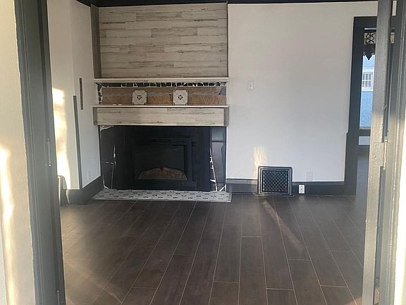 picture from sunny room facing the fire place