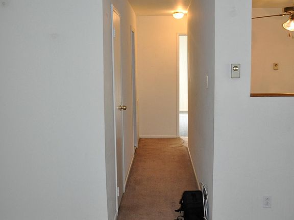 Main Living room leading into hallway.