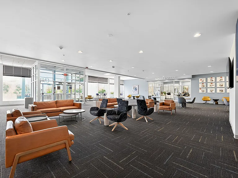 Spacious and inviting lobby area with stylish seating, modern decor, and ample natural light, perfect for welcoming guests and making lasting impressions.