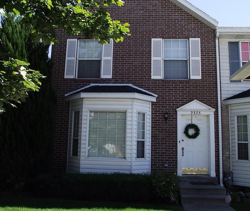 Front of home, unattached on left side.