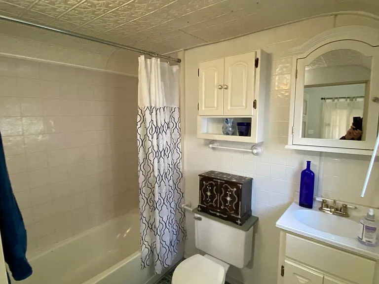 The first bedroom's attached bathroom