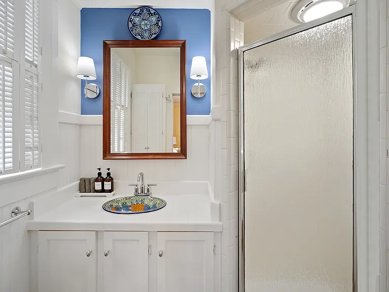 Ensuite half bath for back bedroom