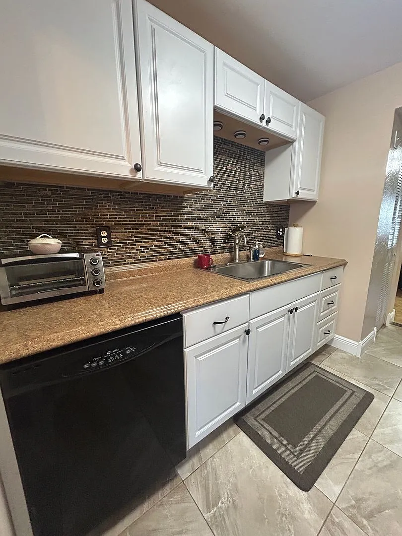 Coastal Living Awaits Stylish Condo Near the Beach! — Photo 4