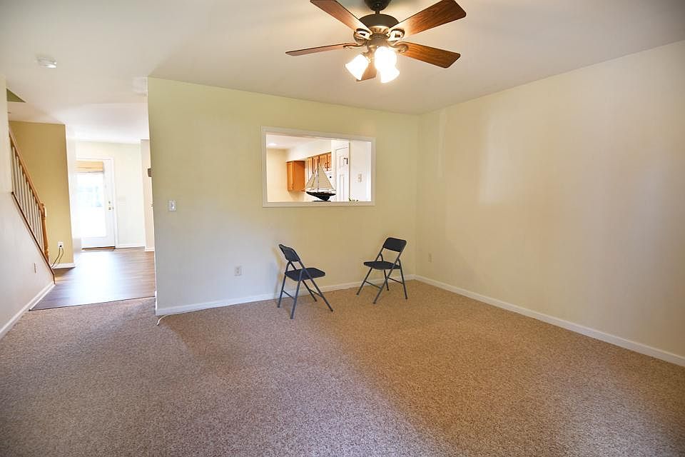 Living room with opening to kitchen
