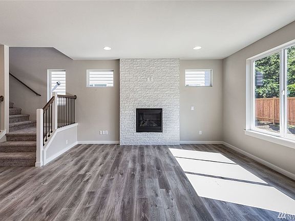 Photos are of the Huntington plan at Holley Brooke Lot 16, and may depict enhancements and/or upgrades that are not available with every plan.