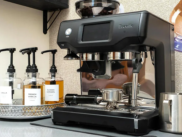 Resident Coffee Station Featuring Breville Machine and Flavored Syrups