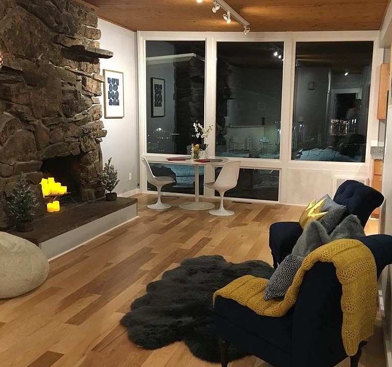 Living Room at Night Featuring Moss Rock Hearth