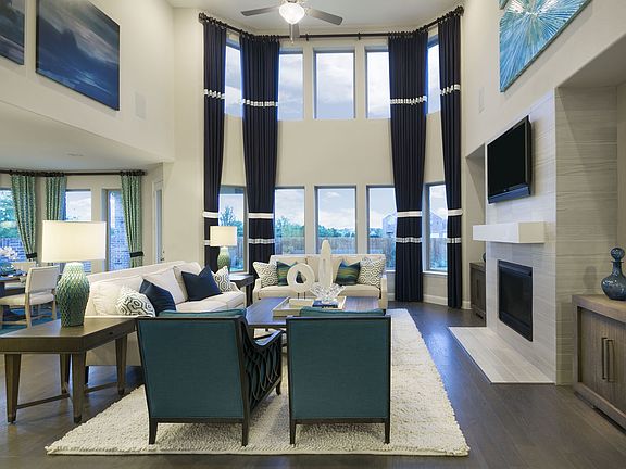 This soaring family room is a breath of fresh air formerly featured at Trinity Falls.