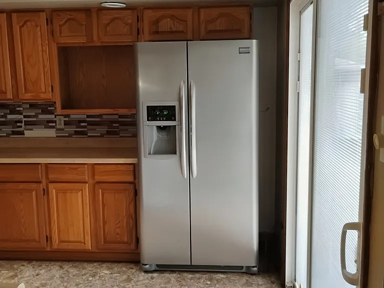 View of the refrigerator from the dining-room