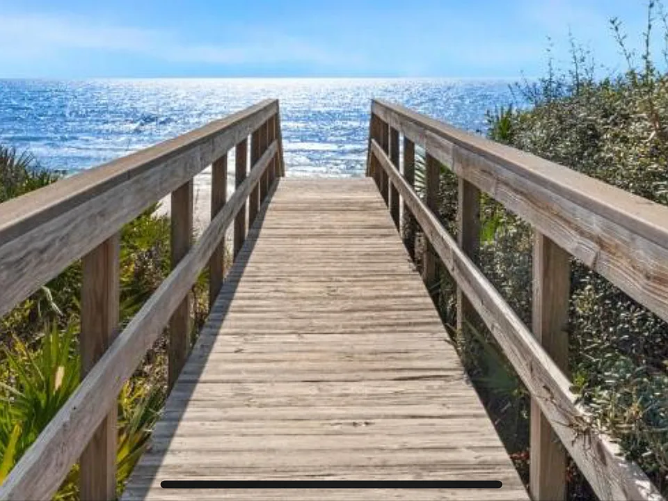 This is the short boardwalk leading to spectacular views and sugar white sands.