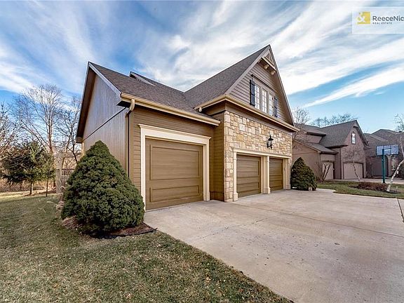 Let's start your photo tour with some of the very best features: including this 9' garage door into an extra deep 3rd garage bay. Perfect for oversized vehicles, your boat, a workshop, just about whatever you need!