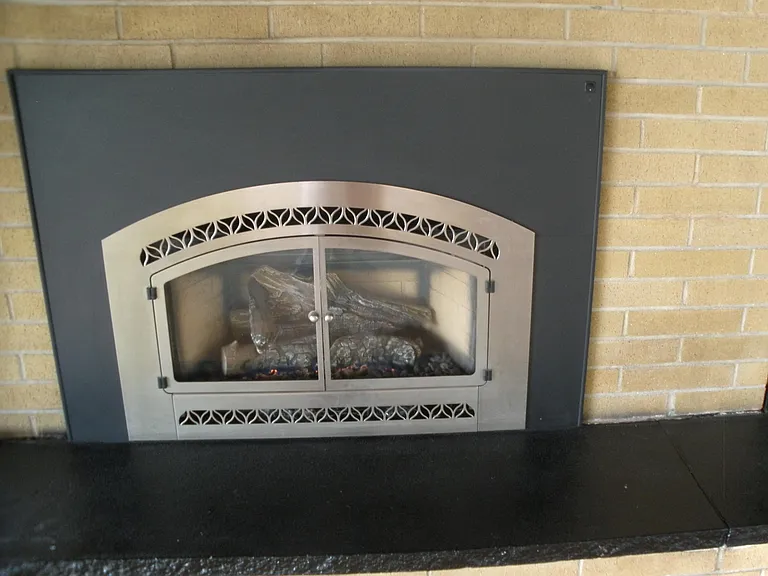 Gas log fireplace in living room