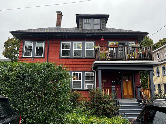 Front of House. Unit is on the second floor. Top window is for the attic.