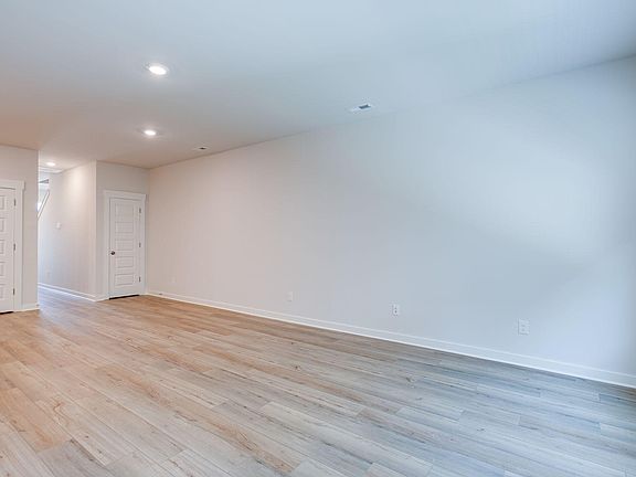 Living Room to Dining Room open concept with additional Storage closet