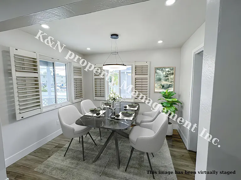 Dedicated dining room with plantation shutters