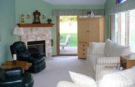 Living Room.
						:
						Cathedral ceiling, gas fireplace, patio doors to deck.