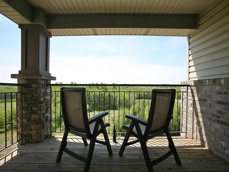 Enjoy serene balcony views overlooking the natural beauty of Zorinsky Lake Park, right from your home.