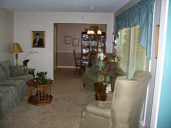 Formal Living Room and separate Dining Room seen from Foyer