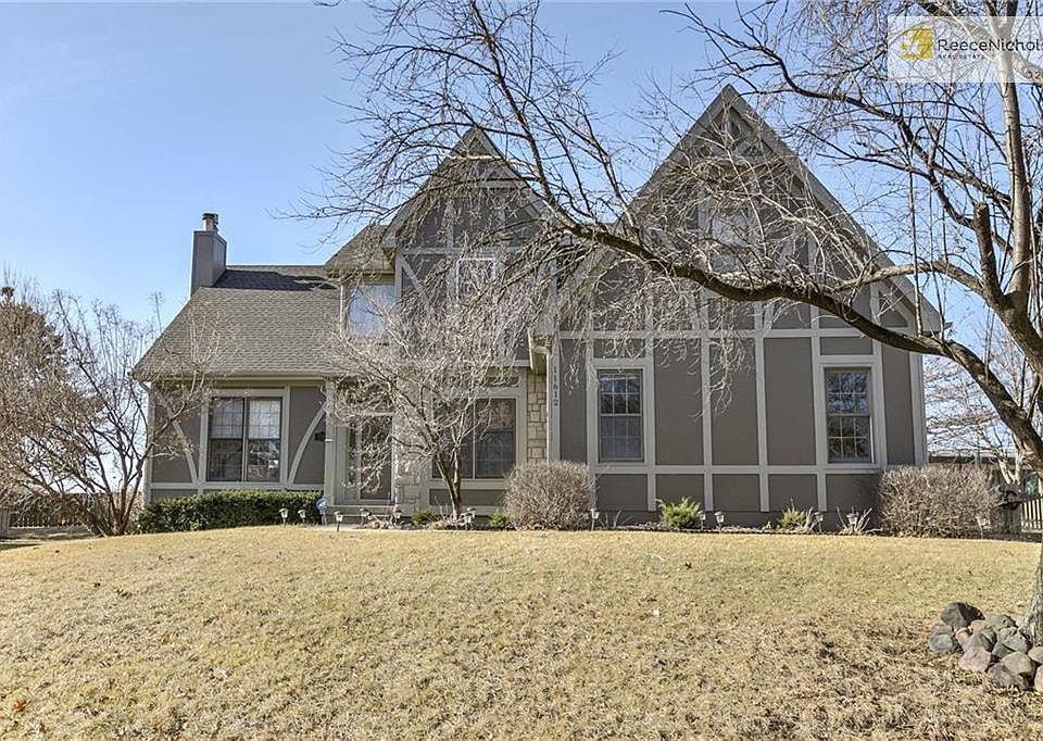 Beautiful front elevation with fresh exterior paint and side entry garage.