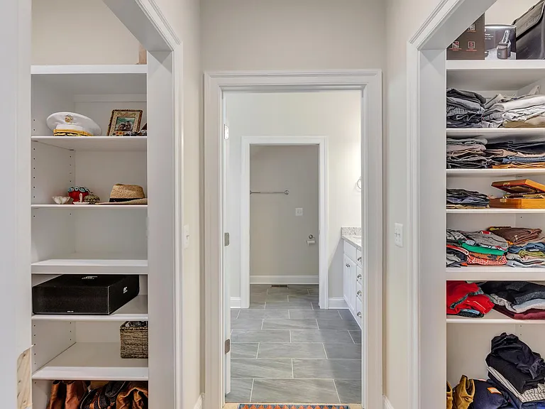 2 walk-in closets in primary bedroom, connecting to en suite primary bathroom.