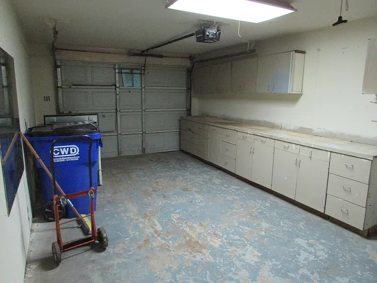 Garage with Large Workbench and Storage