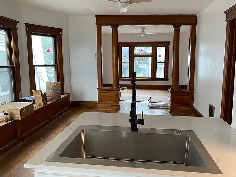 The sink overlooks the living space and has enough space for two seats at the breakfast bar on the back side. This is great for engagement with house mates and hosting.