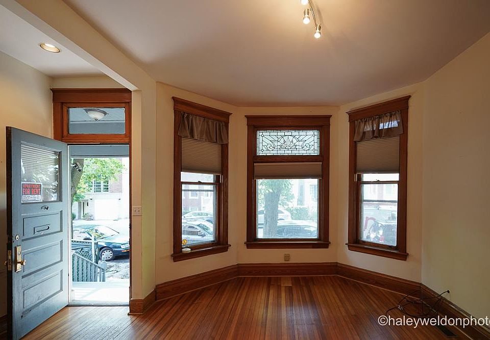 Front entrance, bay windows with pull down blinds