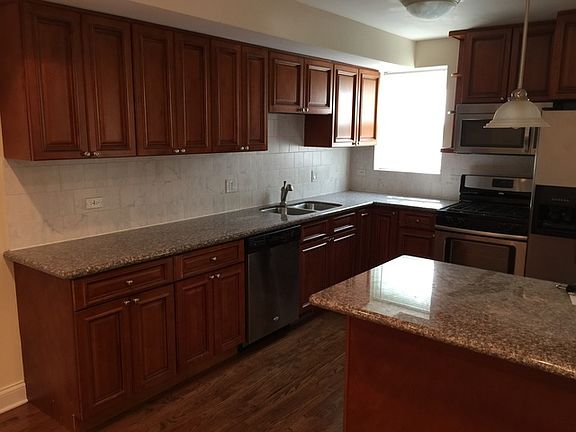 5th image of 3835 W Estes Ave