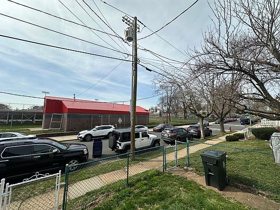 Football Field, Park, Basketball court and track across the street.